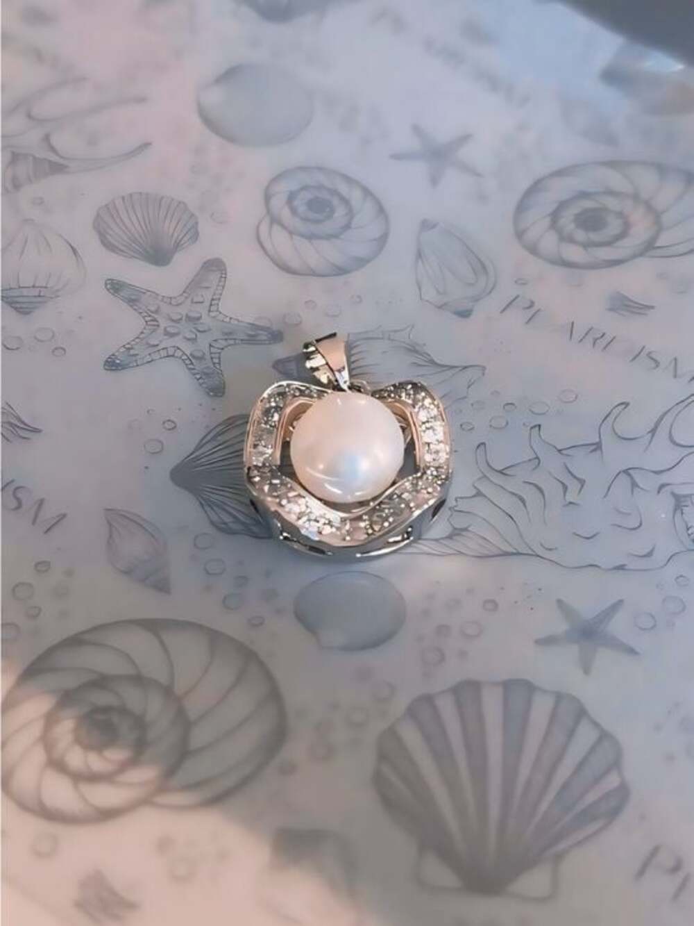 Sterling Silver Pearl Pendant with Sparkling Accents